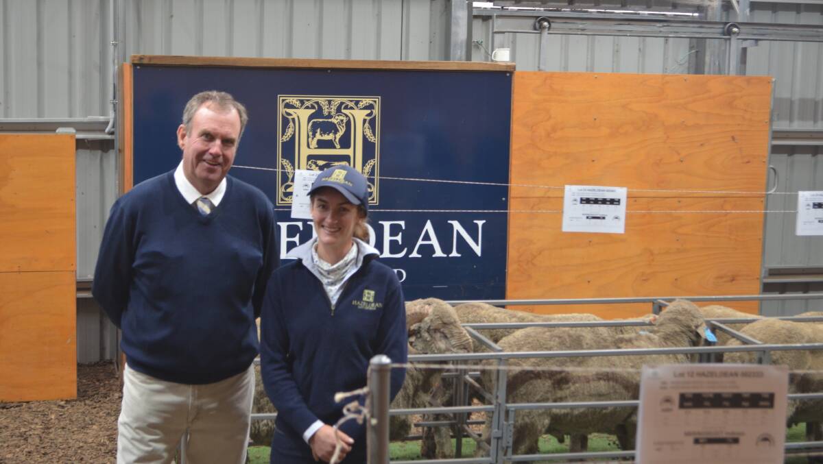 Guest auctioneer Paul Dooley, Tamworth congratulates Bea Litchfield on another successful ram auction conducted by the Litchfield family, Hazeldean, Cooma