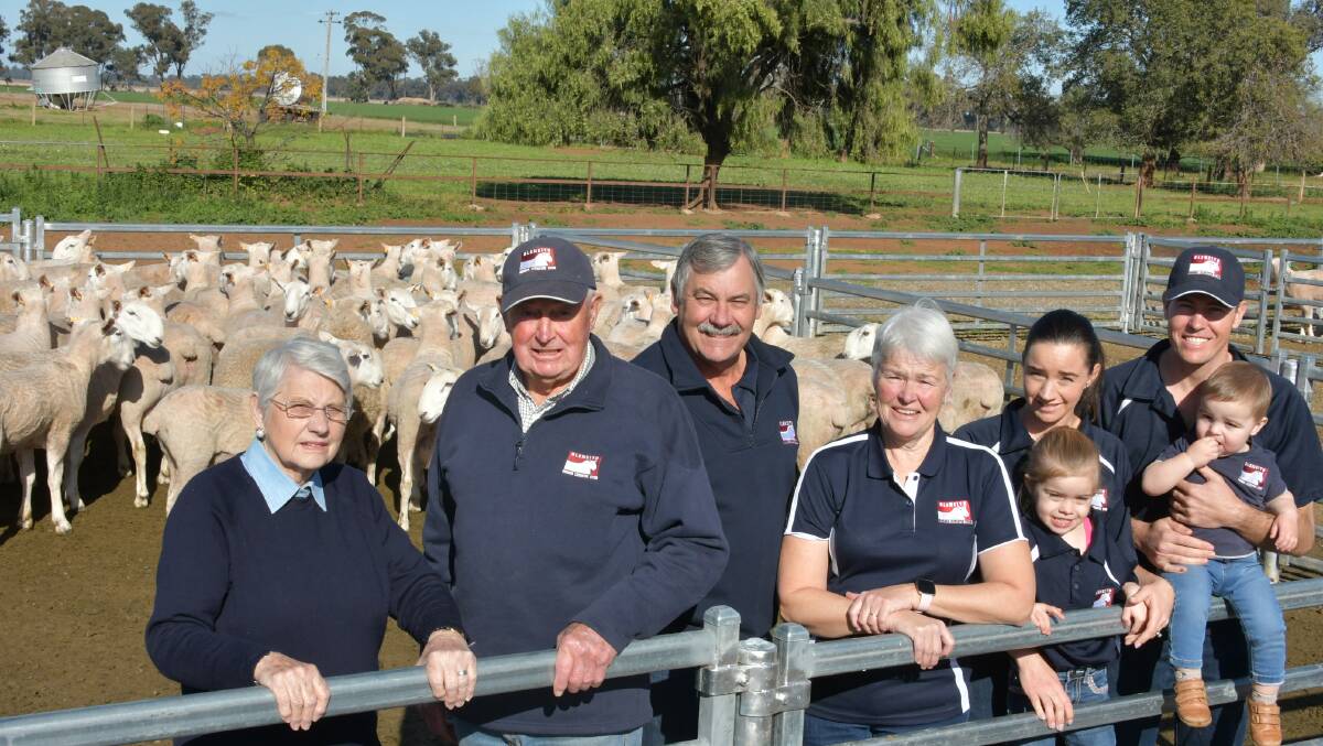 A family committed - Heather, Will, Wes, Julie, Rachael, Annabelle, Nathan and Jackson Kember at Gleneith Park, Ganmain, home of the Gleneith Super Borders stud. Photo: Brett Tindal