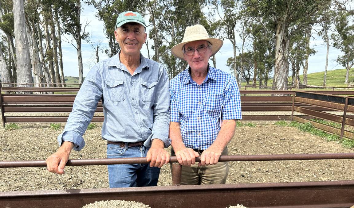 Brian Corby, winner of the 2024 ANZ Agribusiness Taralga Flock Ewe Competition, with Neil Lynch, Berridale, one of the judges. Picture supplied by Krisi Frost