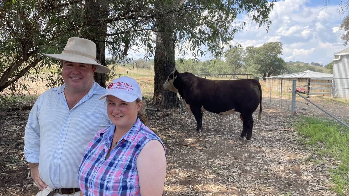Marc Greening, Injemira Beef Genetics, Ladysmith, with the top priced bull Injemira Patriarch S042 (PP) purchased by Grace Elsom, Emigrace Poll Herefords, Macarthur, Victoria.