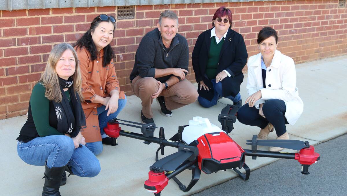 With their drone: Project team members Hillary Cherry NSW DPIE, Associate Professor Lihong Zheng Charles Sturt, Dr Remy Dehaan and Dr Jane Kelly Charles Sturt University, Wendy Menz NSW DPIE. Photo: Graham Centre
