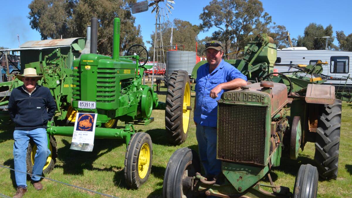 John Kingston, The Rock and Brendan Mott, Burrumbuttock with their vintage John Deere tractors.