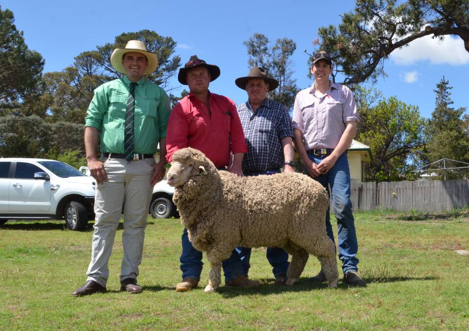 Damien Roach, Nutrien Ag Soutions, Cooma, Wayne and Stephen Mackay, Frying pan, Cooma and Tim Green, Boudjah, Cooma with the top priced Boudjah ram.