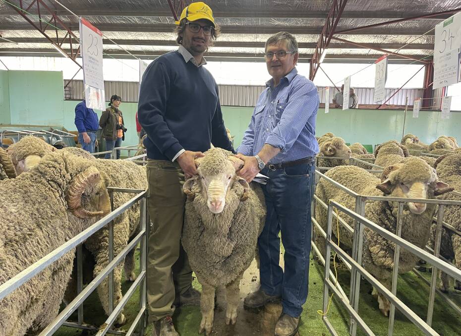 Robert and Peter Allen, Temora, with the third top price ram purchased during the Cottage Park sale.