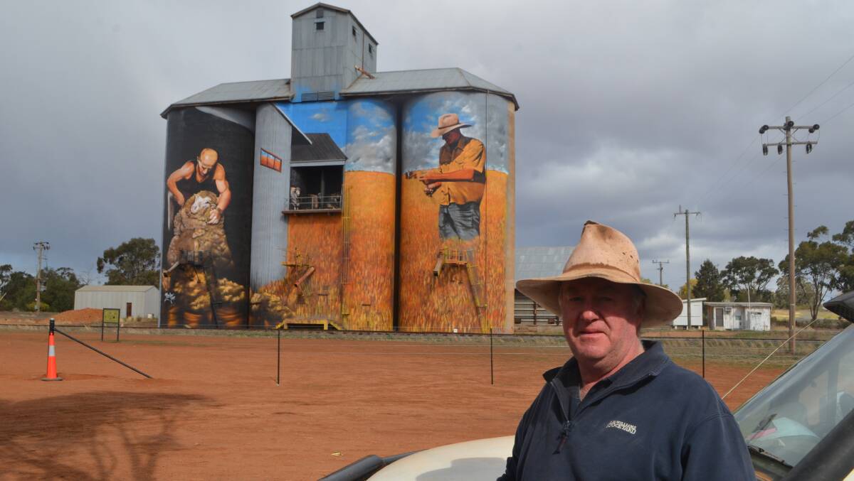 Paul Northey proudly displaying the painted silos lifting the profile of Weethalle attracting many visitors.