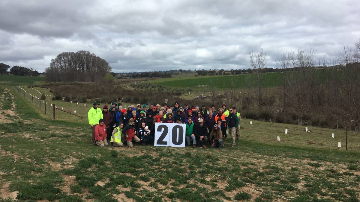 Volunteers celebrating 20 years of planting trees in the Boorowa district. An agreement signed this month will assure the program continues for another five years. Photo: Linda Cavanagh, Boorowa Landcare Group