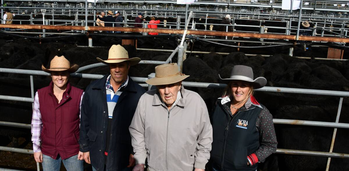 93 year old Warren Faulder, Amarina Angus, Mt Horeb via Adelong, with his son Brett and granddaughters Ellie and Emma with their annual draft of Innesdale-blood Angus weaners. Their top pen of 75 weighing 372kg and eight to ten months sold for $2020. 