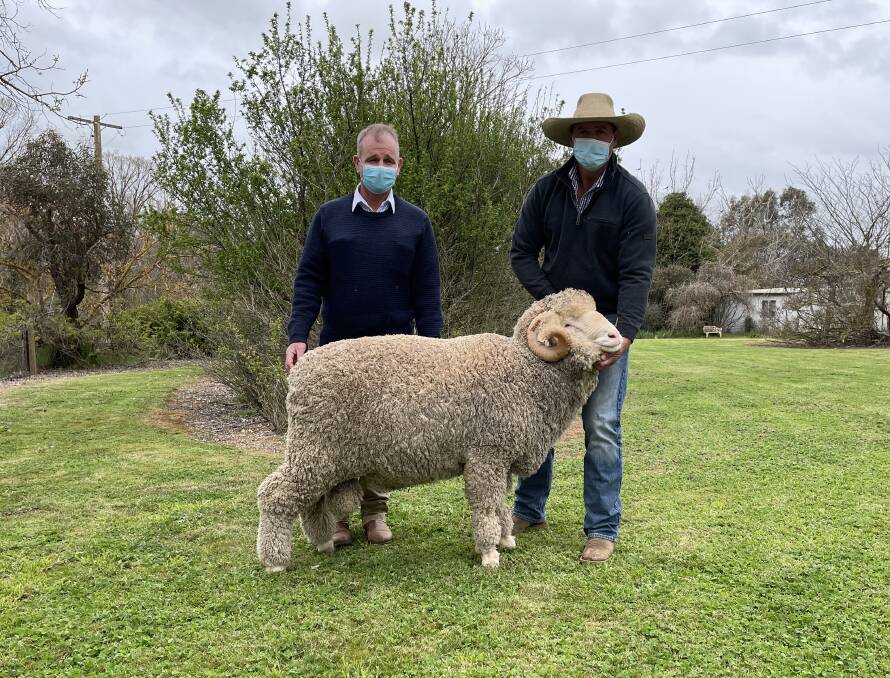 Guy Evans, Tara Park, Boorowa, with Mark Pendergast, Cottage Park, Cooma, and the second top priced ram.