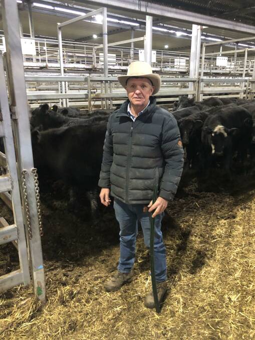 Michael Unthank, BUR, Wodonga, and 40 Angus weaner steers weighing 352kg that sold for $1960 at Wodonga store sale on Thursday. Photo: supplied