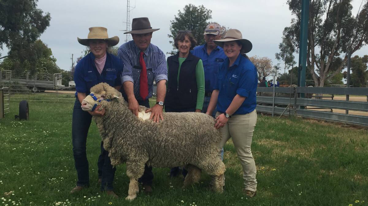 With their $6500 purchase Debbie and Graham Mott, Yerong Creek (centre) and Phoebe, Colin and Amelia McCrabb, Avenel, Wanganella.