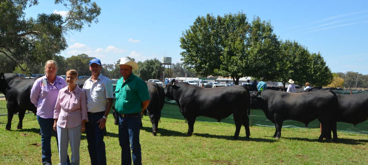 Top-price bull buyer, Helen Olsen, Charters Towers, Qld, with her friends, Lois and Grahame Musk, Charters Towers, and Peter Govan, Rennylea Angus, Culcairn. Rennylea M1172 was bought for his growth, structure and overall appeal.