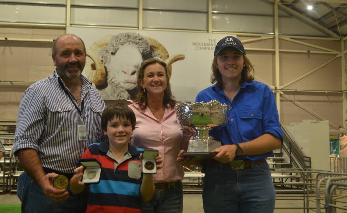 Pete, Jamie, Jayne and Cade Lette, Conrayn stud, Berridale with their medallions for grand champions plus the RAS of NSW Supreme Merino Perpetual Trophy for thier supreme exhibit, a ram which had come through the superfine wool classes.