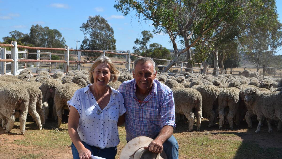 Winners: Narelle and Bruce Nixon, Clovelly, Frogmore with the championship winning flock of Tara Park-blood Merino ewes.