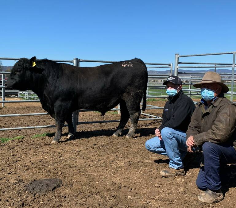 The top-priced bull at $15,000 with Charlie Croker, Nutrien, Goulburn and Burbong Angus studmaster Ian Darmody. Photo: supplied
