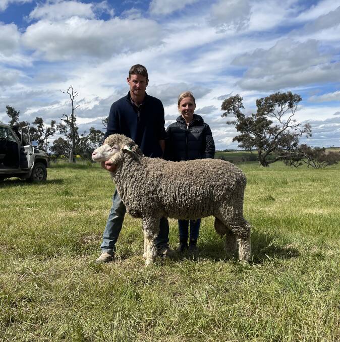 Max and Zoe Giles, Binalong, with their $11,000 purchase - a true dual-purpose sire with balnced set of data and excellent structure.