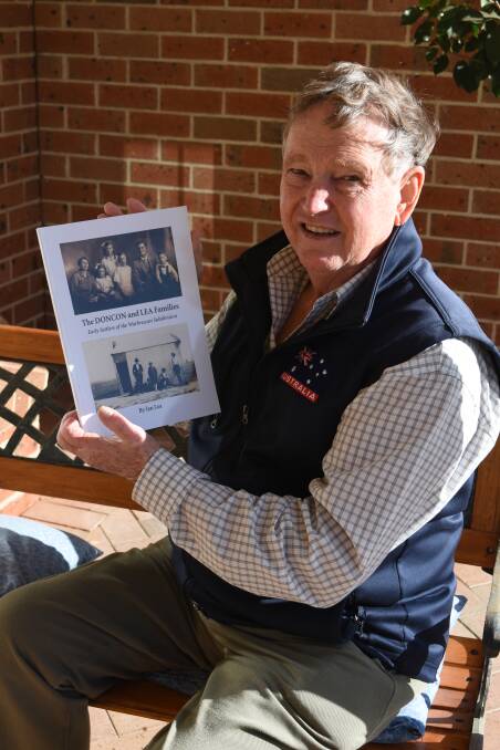 Ian Lea proudly displaying a copy of his latest book, a history of the Doncon and Lea families who farmed the Warbreccan Subdivision, near Deniliquin. Photo: supplied
