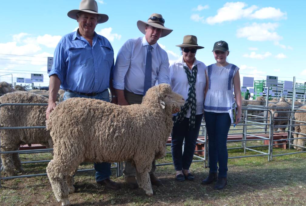 Dougal McLeish, Stephen Huggins, Susan Ainge and Lily Huggins with the $5,000 purchase made by Dougal and Susan for their Coonamble-district property. 