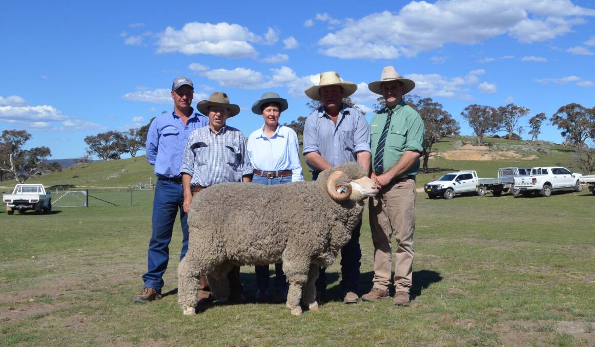 Gary Evans, MLP Cooma, buyers Gordon and Jenny Crowe, Michael Hedger, Snowy Plain and Rick Power.