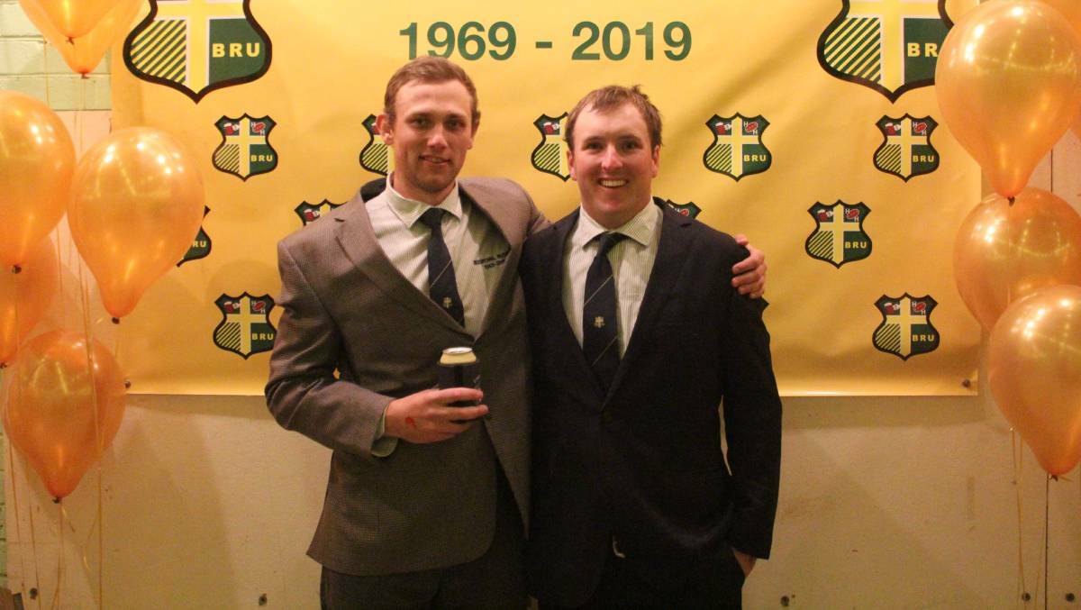 Young guns: Rumbo and Marty Corcoran celebrating the half century of Boorowa rugby.