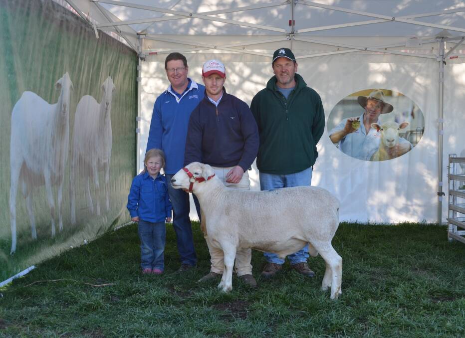 Jason and Matilda Baker, Timor Studs, Ross Gilmore, Tattykeel studs, and Josh Clinton, Camden Valley Australian Whites, with their jointly purchased ram.