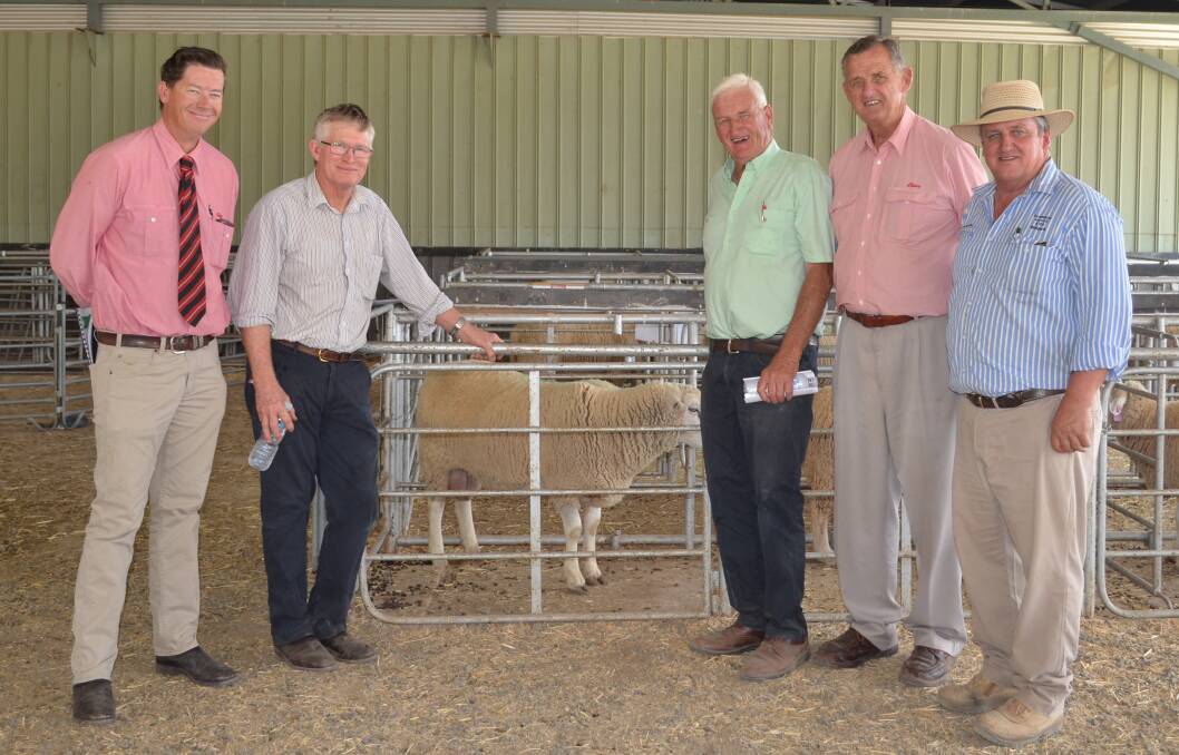Mark Jones, Elders Walgett, Michael Hoare, Bel-air Pastoral Co, Nyngan, Peter Jackson, Coronga White Suffolks, Andy McGeoch, auctioneer, Elders, and Chris Clemson, Clemson Hiscox and Co, with the top priced ram.