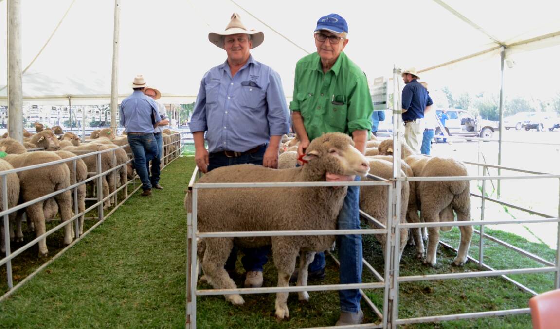 Chris Clemson, Clemson Hiscox and Company, Walgett, and Robert Campbell, Tamworth, with the third top priced ram.
