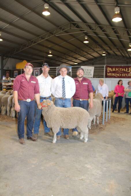 Scott Mudford, purchaser Hugh Taylor, Lincoln McKinlay, Robert Mudford with the top priced ram. 