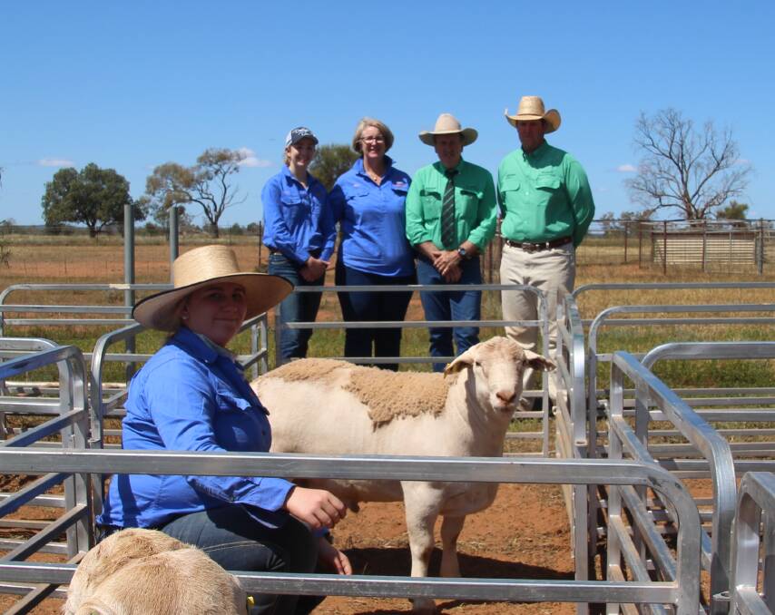Etiwanda's Emily Mosley with the top priced ram while Jess and Megan Mosley look on with David Russell and Luke Scales, Nutrien Russell, Cobar.