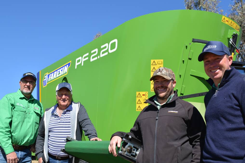 Chesterfield Australia's business development general manager, Luke Rowney, Trevor and Richard Coombes, Glen Alfa, Manilla, and Hayden Hollis, Landmark, Tamworth, discussing the Faresin feed mixer range at AgQuip field days.