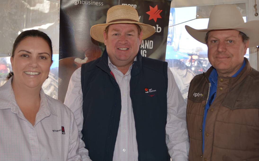 National Australia Bank's Moree agribusiness manager, Marianne Pollock, with  agribusiness customer executive, Khan Horne, and Charles Hill, "Karapiti" Quirindi, at AgQuip field days.