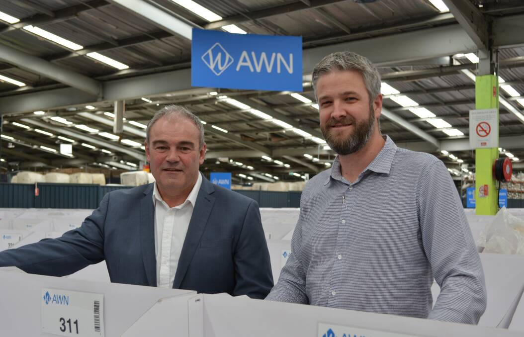 AWN chairman, John Maher, and chief operating officer, Rick Maybury at Sydney's Yennora wool selling centre, where the company has its head office.