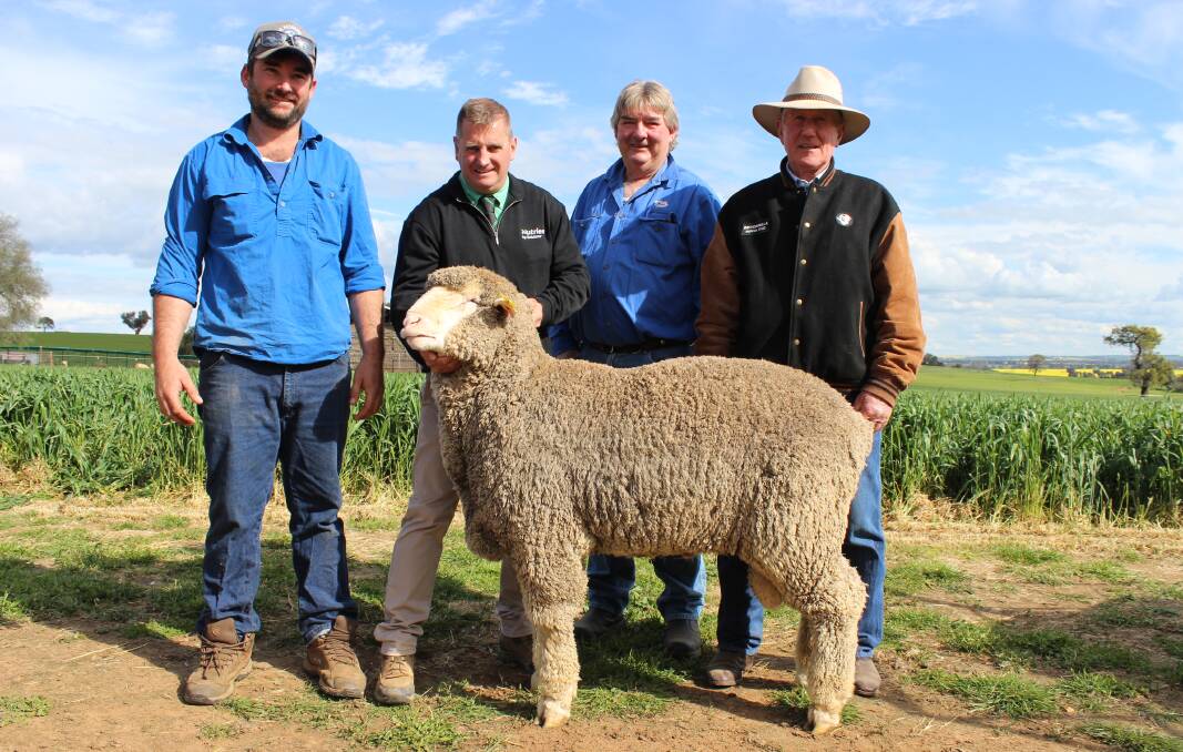 The top-priced ram with buyers Sam and Geoff (second right) Beath, Bryton Wool, Canowindra, auctioneer Rick Power, Nutrien, and vendor Ian Griffith, Brundanella. Photo: Supplied