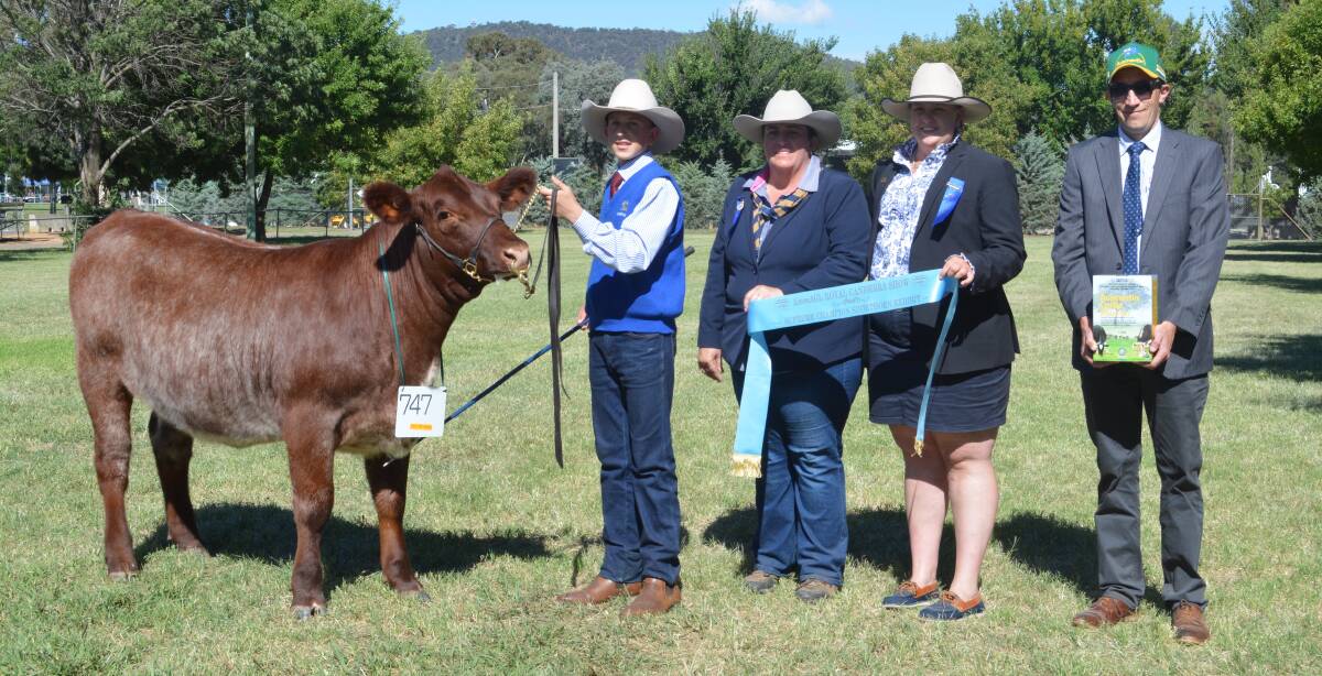 SUPREME: STG Ripple exhibited by St Gregory's College and led by year 10 student Macs Rubain, with judge Renae Keith, Allenae Angus and Poll Herefords, Roslyn, associate judge Emily Polsen, Grace Valley Livestock, Yass, and sponsor Ben Lawrence, International Animal Health, Sydney 