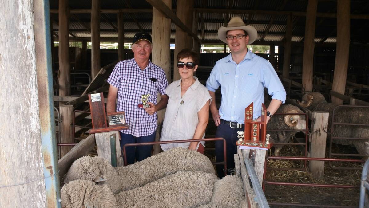 Taralga Flock Ewe winners Geoff and Margaret Croker of Meadow Drive, Golspie with ANZ's Andrew Treweeke. Photo by Clare McCabe, Crookwell Gazette. 