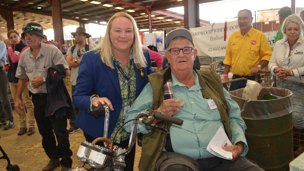 RAS councillor Rowena Petrie presented an award of excellence to Alan Comerford for his continued service and dedication to the Dubbo Show. 