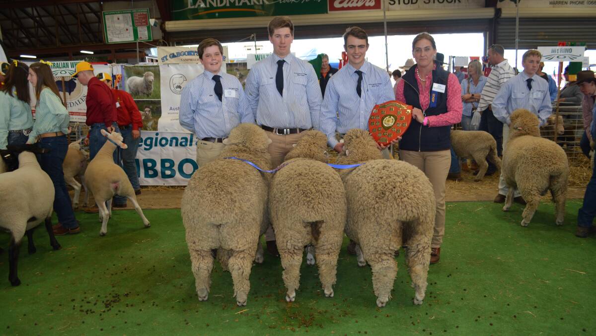 The Goongunyah Shield winning team of Corriedales from the Badgally stud at St Gregory's College included Ben Kelly, year 9, Angus Herbert, year 11, and Conlan West, year 11, who are pictured with judge Deva Weitman, Blue Rock Suffolk stud, Romsey, Victoria. 