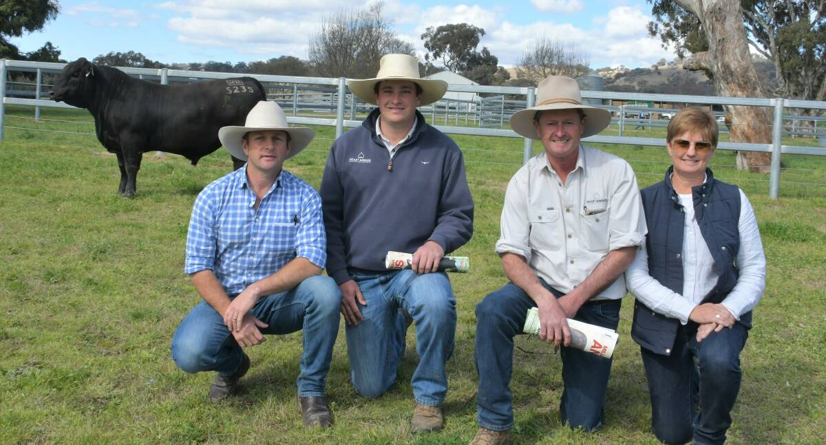 The $110,000 top-priced yearling with buyers Ben Noller of Palgrove, Dalveen, Qld, and Jye, Chris and Natalie Paterson of Heart Angus, Timbumburi near Tamworth. 