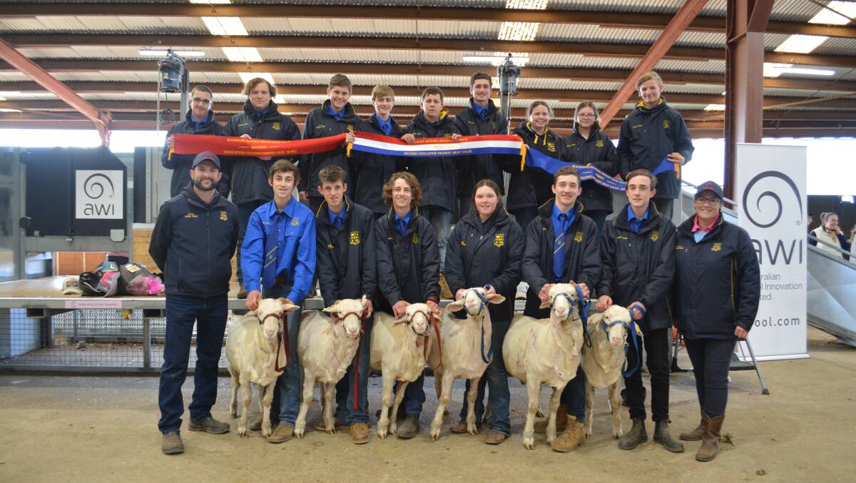 HIGHEST MEAT VALUE: Forbes High School students with their sheep and teachers. 