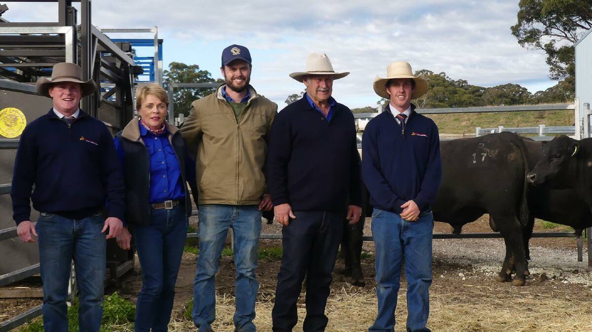 Davidson Cameron and Co agents Angus MacTavish and Nick Rogers (far right) with Geralyn, James and Roger Flower of Bridgewater Angus, Black Mountain. 
