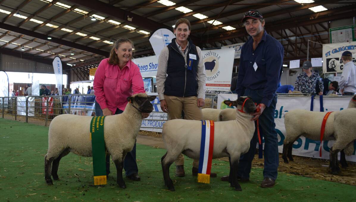The reserve and champion South Suffolk ewes held by Amanda and Steve Conley, Gotta Rock stud, Yerong Creek, with judge Deva Weitman of Blue Rock Suffolk stud, Romsey, Victoria.