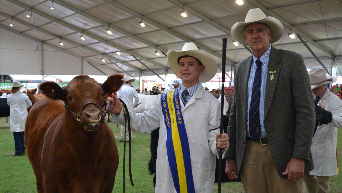 Reserve champion RAS/ASC beef cattle parader Hamish Maclure, Tarcutta, with ASC vice-president Tim Capp, at the 2018 Sydney Royal Show. 