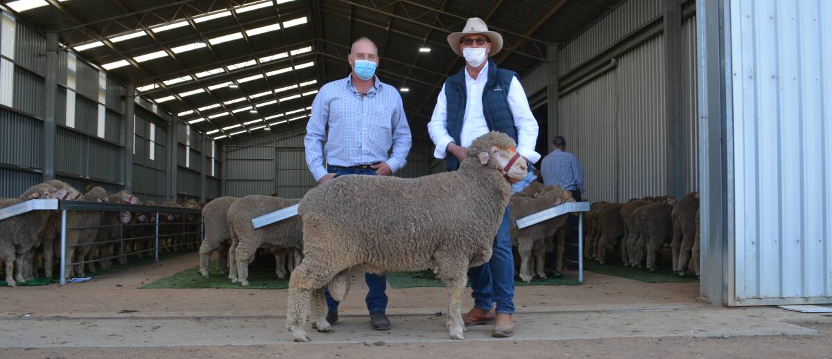 The $16,000 top-priced ram with buyer Scott Byrne, Goulburn and Kerin Poll principal Nigel Kerin, Yeoval. 