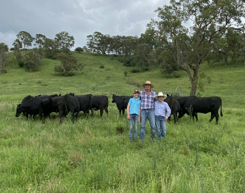 Nigel Meyn, Benledi Pastoral Company, Singleton, with children Matilda, 11, and Campbell, 10, and 17 to 18-month-old Dunoon Angus heifers. Photos: supplied 