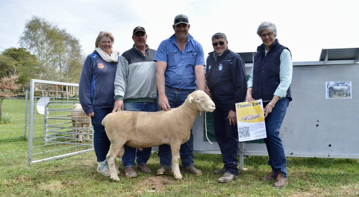 The Cancer Council charity ram which raised $2500 with purchasers Cheryl, Geoffrey and James Gilbert, The Grove, Trunkey Creek, and Greg and Christine Healey, Mt Bathurst stud, Black Springs. 