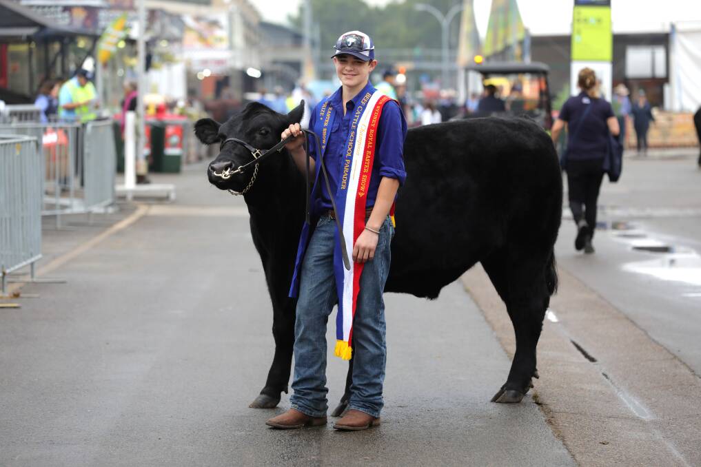 Champion school parader Tom Clare, Dural, with The Kings School's Noel Williams Shield winning Angus school steer bred by Milong Angus stud, Young. 