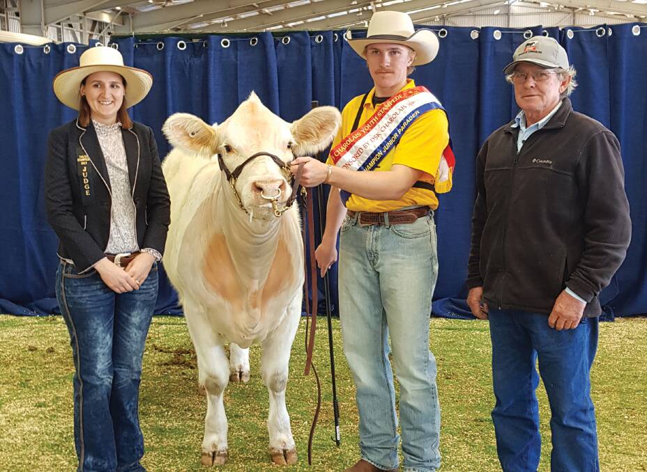 Judge Kate Redfern, Molong, with champion parader Nathan Hanson, Dubbo, and sponsor Chris Knox, DSK Angus and Charolais, at the 2019 Charolais Youth Stampede. Photo: supplied
