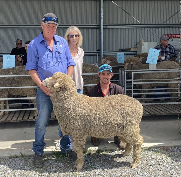 The $5000 top-priced Poll Merino ram with stud principles Tony and Dianne McGaw, Niela stud, Laggan and buyers representative Scott Madden. Photo: supplied 