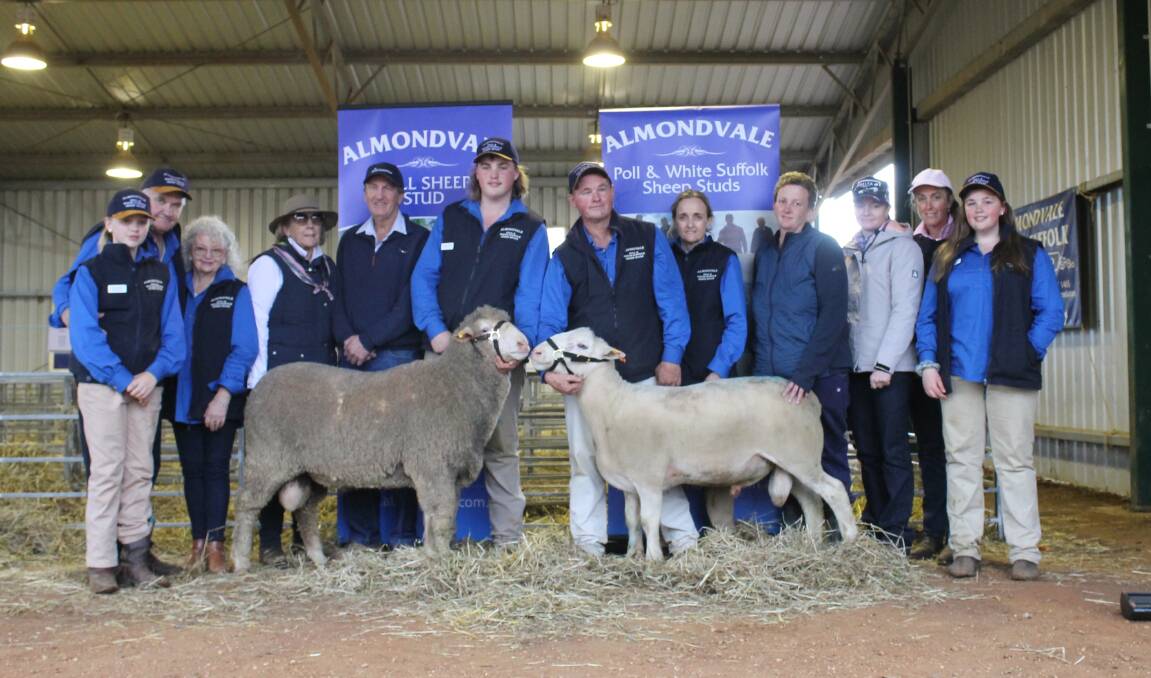 Top Price Rams: Poll Merino Lot 16 sold for $7000 and White Suffolk Lot 3 sold for $4000 with Ruby, Peter and Marita Routley, Urana, Noelene and Russell Henderson, Deniliquin, Lachlan, Paul and Dalles Routley, Urana, Heather Mcleod, Walla Walla, Tracy Broadman, Walla Walla, Cheryl Paech, Walla Walla and Grace Rotley, Urana. Photo: Charlotte Nugent 