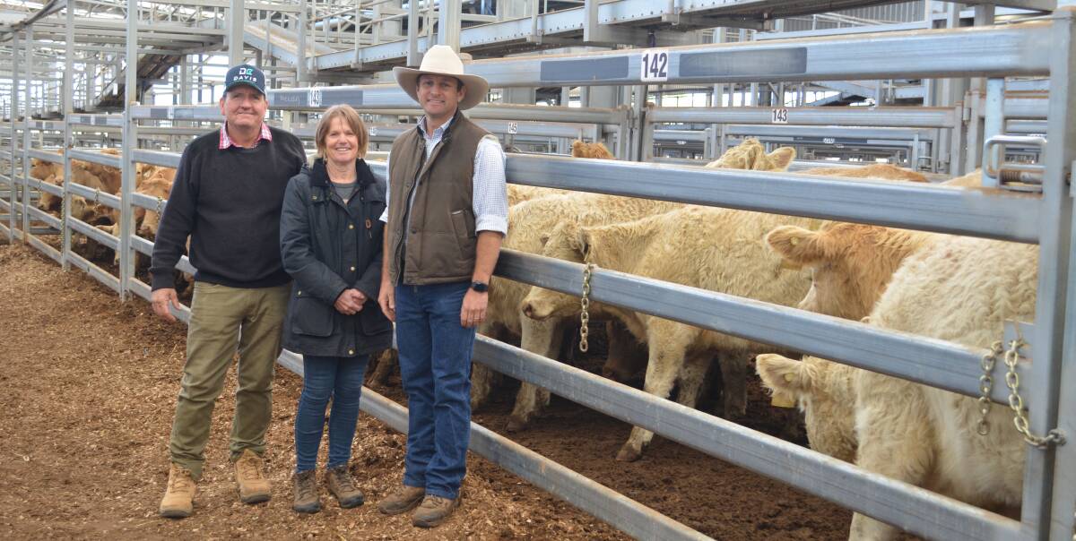 Tim and Sue Davis of Mount Boo, Willow Tree, with Ben Noller, Palgrove. The Davis' purchased a total of 36 Palgrove Pastoral females including a pen of 16 purebred Charolais NSM yearling heifers for $2225 a head. 