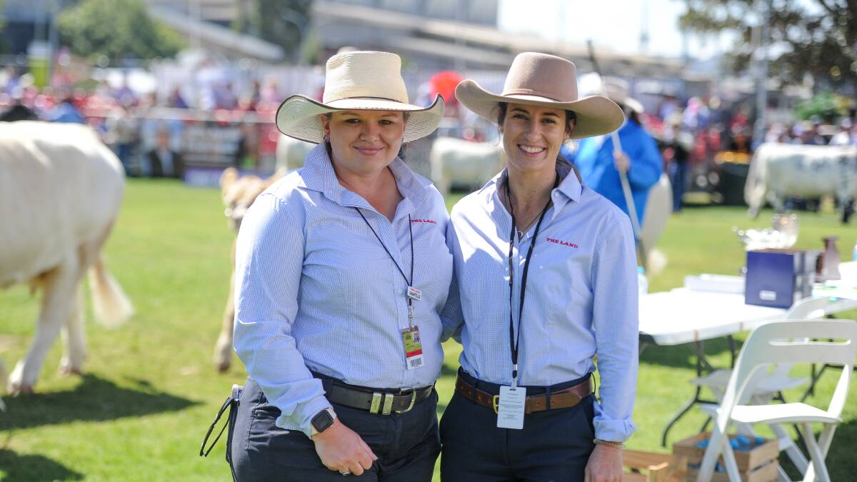 Chasing champions: Shantelle Lord, Hannah Powe and the entire The Land team chased champions, and sale toppers, across all parts of NSW and at Beef Australia 2021, Rockhampton, Qld. Photo: Lucy Kinbacher 